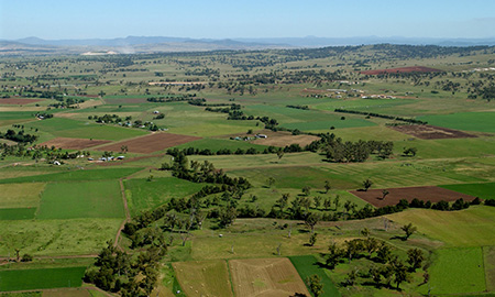 Aerial view of patchwork green farmland