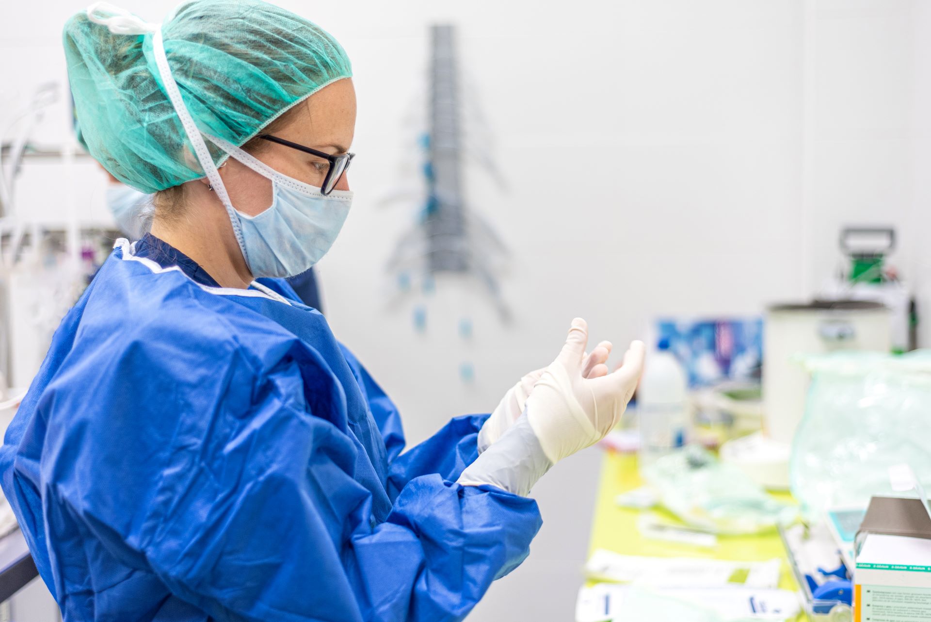 Scientist in laboratory looking at sample