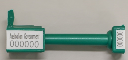 A green export tag with "Australian Government 000000" written on a white background