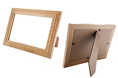 Image of empty photograph frames with front and back components constructed from wood.