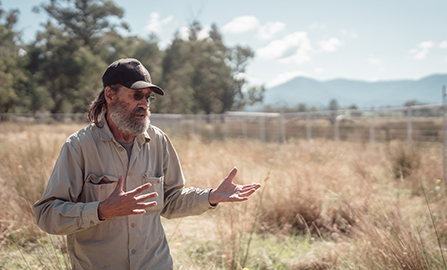 Uncle Dave Wandin in a field of dry grasses