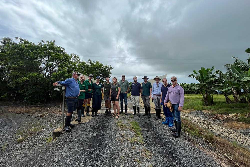 Employees from Shayne and Blaise Cini – Karden (Qld) Pty Ltd standing on a road