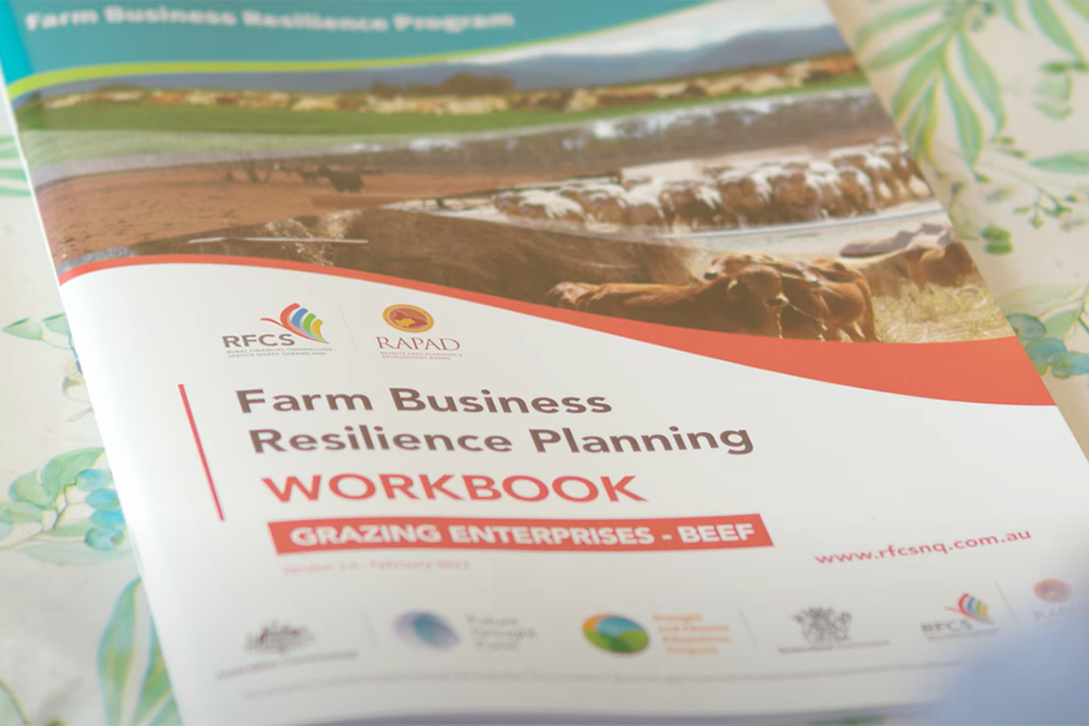 Image of the front cover of a paper document titled "Farm business resilience planning workbook"